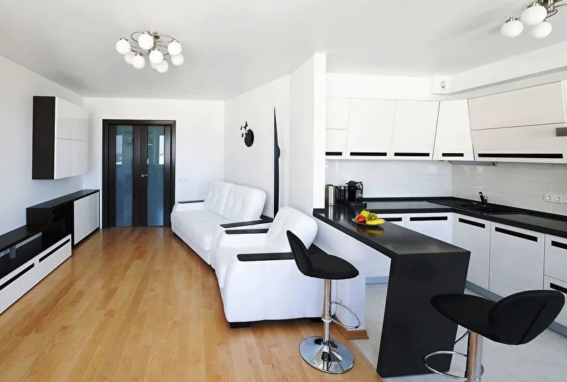 Дизайн интерьера гостиной в черно-белых тонах - фото